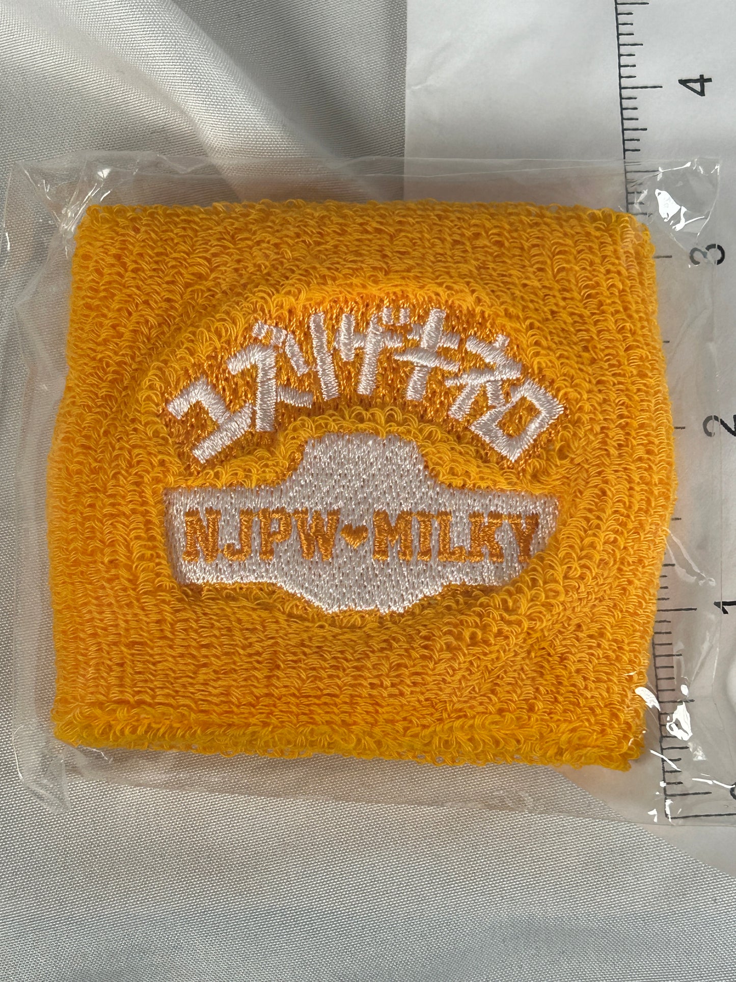 Milky Holmes x New Japan Pro-wrestling Orange Wristband Yuzurizaki Nero