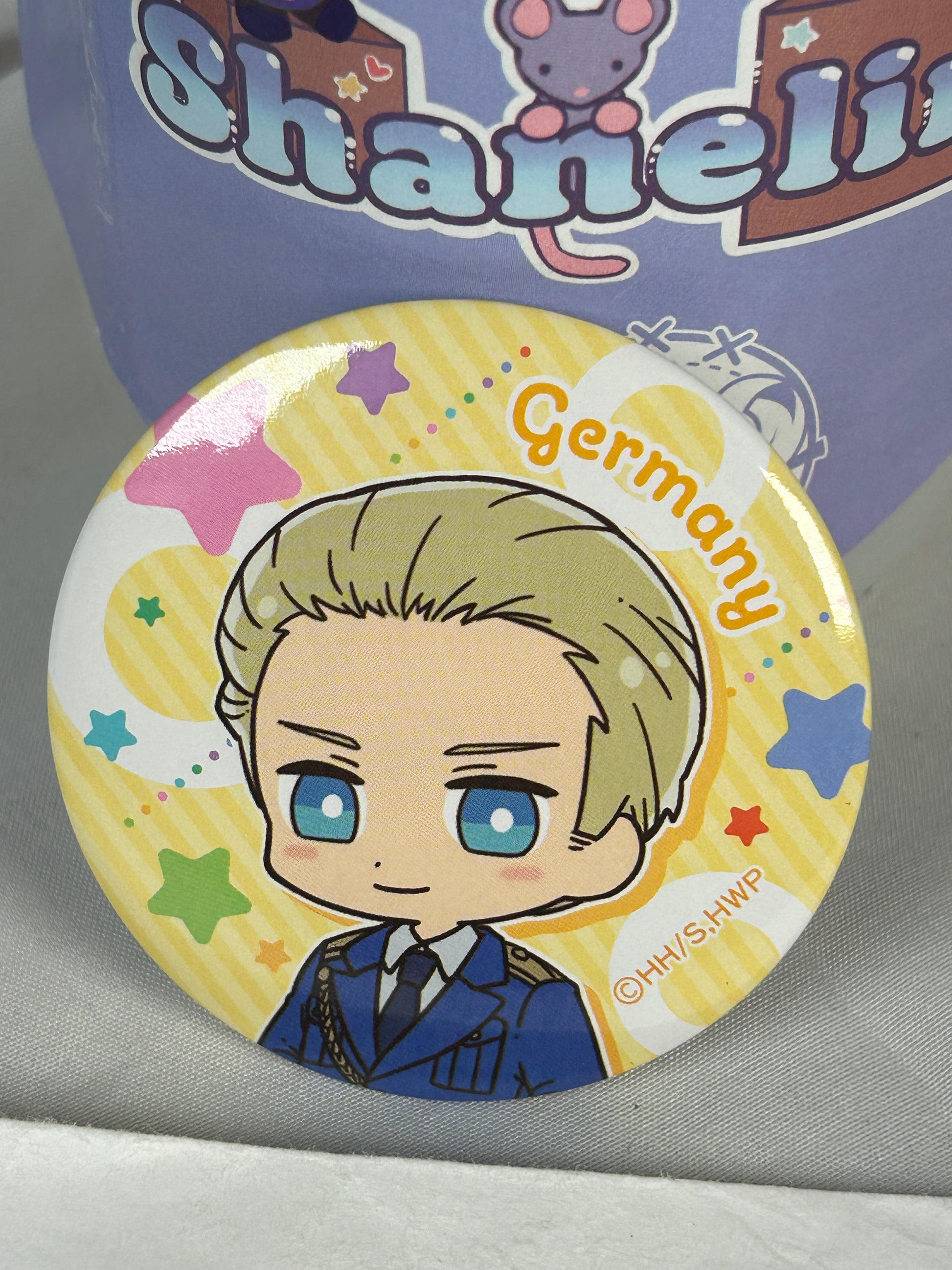 Germany from Hetalia in a suit on a button